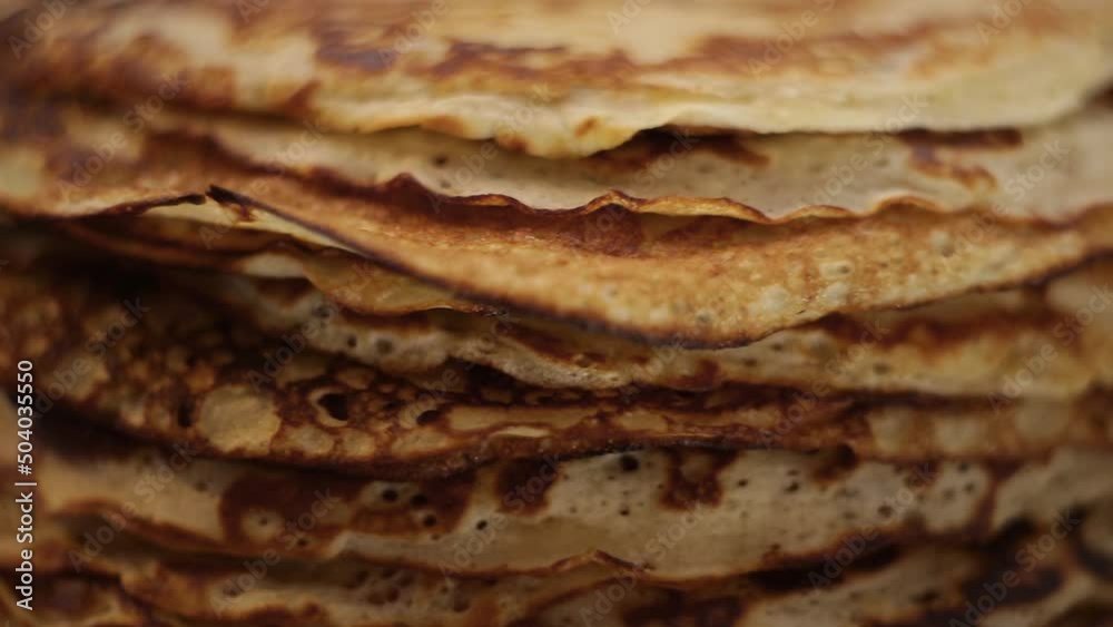 close-up of a set of Ukrainian pancakes just cooked and served to the table for lunch close-up of a set of Ukrainian pancakes just cooked and served to the table for lunch