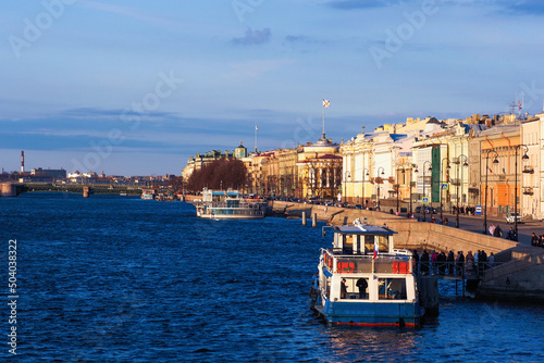 Venice of the North, berths with tourist ships on the banks of the Neva River, Admiralteyskaya Embankment, St. Petersburg, Russia