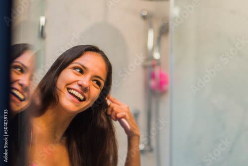 Shampoo & Drying hair in bathroom photo