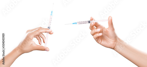 Hand holding syringe with vaccine against corona virus.