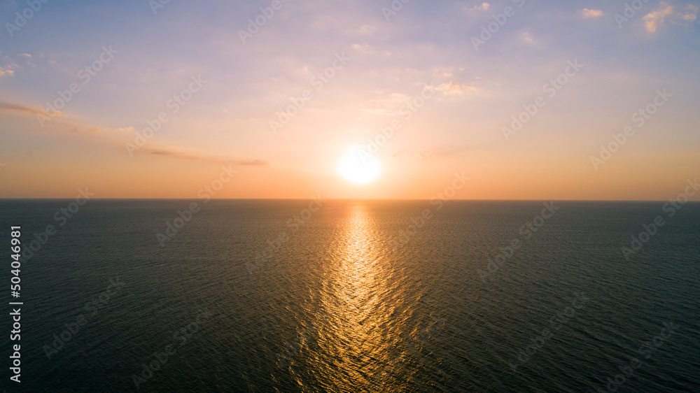 Aerial view Beautiful view sunset over sea surface beautiful wave Amazing light sunset or sunrise sky over sea landscape nature background