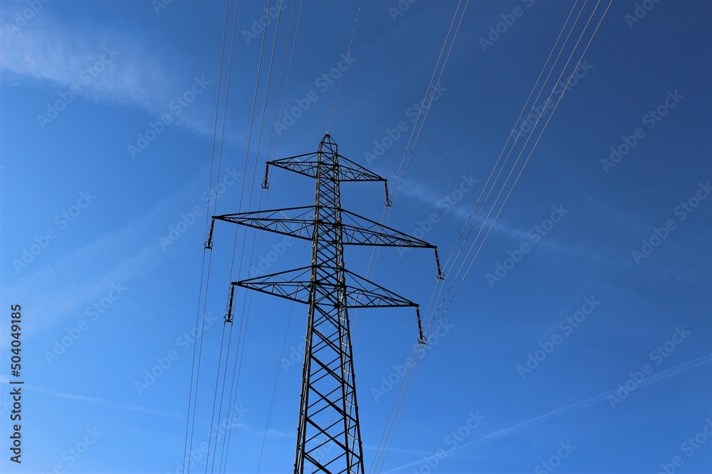 Electricity pylon on a sunny day against a clear blue sky (Switzerland) Electricity pylon on a sunny day against a clear blue sky (Switzerland)