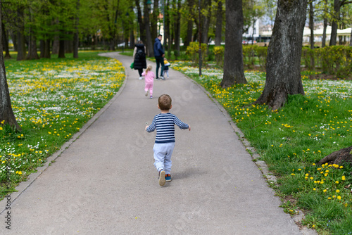 Happy Baby Kids Running Outoodrs in Park photo