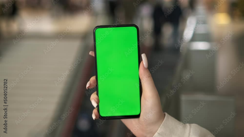 Young Woman Using Touch Screen Mobile Phone. Girl Using Smartphone, Browsing Internet, Watching Video Content, Blogs. POV.