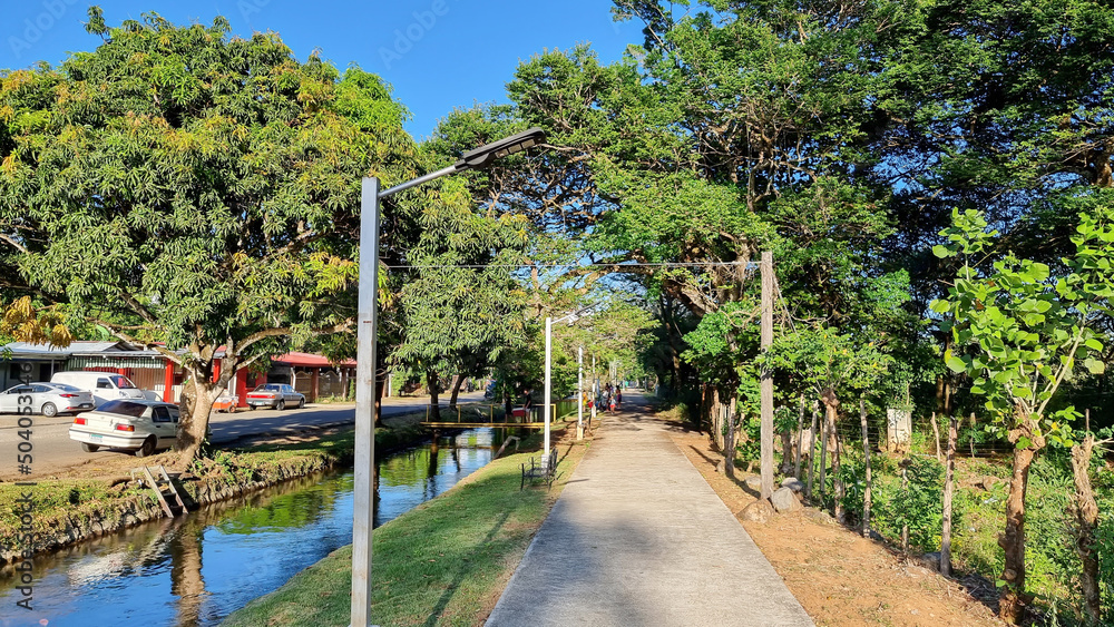 Panama, Chiriqui province, Dolega town, Canoe creek promenade on a sunny day