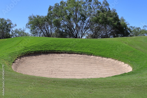 A golf bunker filled with sand