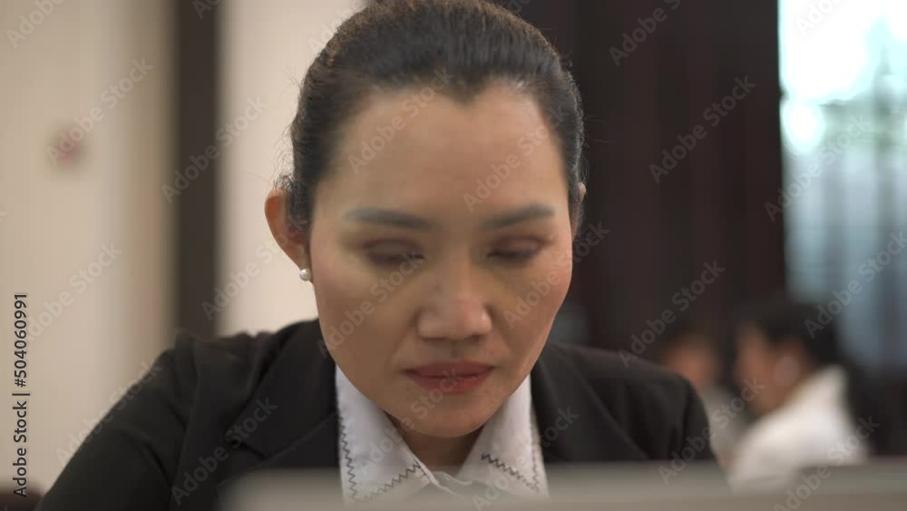 Senior Asian businesswoman using laptop computer for working. Senior Asian businesswoman using laptop computer for working.