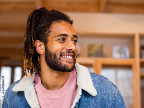 Valokuva Portrait of young man with dreadlocks