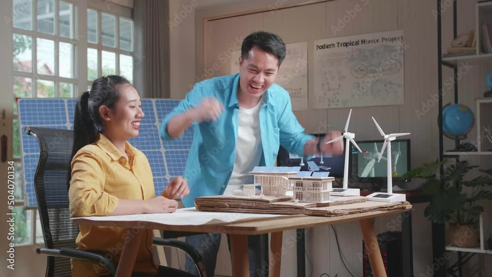 Asian Man And Woman Being Happy Succeed Building A Model Of Small House With Solar Panel
Asian Man And Woman Being Happy Succeed Building A Model Of Small House With Solar Panel