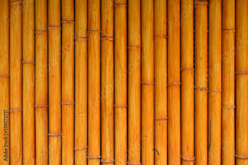 Orange bamboo fence texture  bamboo background