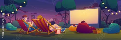 Night open air cinema on lawn in city park, garden or backyard. Vector cartoon summer landscape with empty outdoor movie theater with big screen, chaises, picnic baskets and lightbulb garland