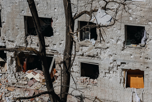 Chernihiv Ukraine 2022: A destroyed building after air attack. Result of rocket or artillery shelling residential buildings by Russian Federation army. Ruins during War of Russia against Ukraine. photo