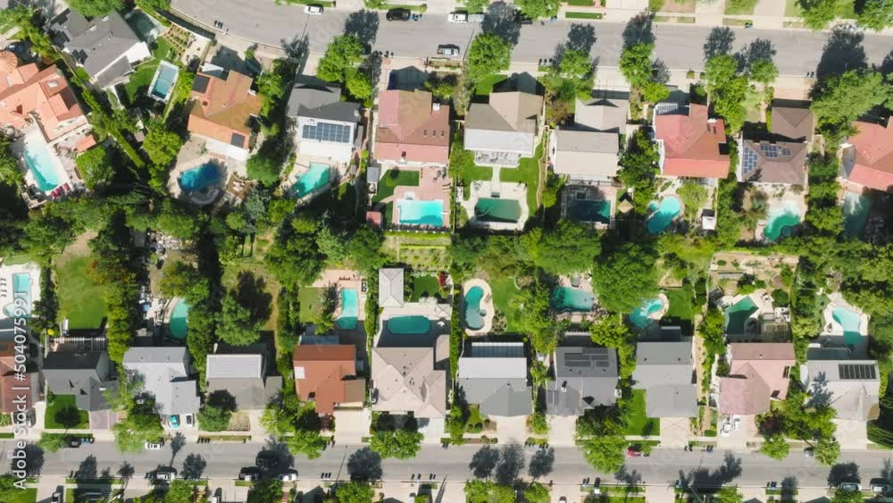 Guardgated community of Calabasas Hills, within lush greenery. Aerial