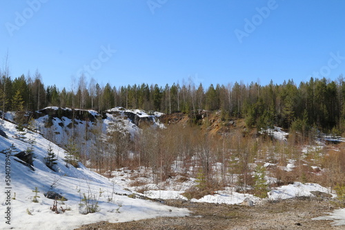 Wallpaper Mural Quarry and rocks in Siberia. Stones, coniferous trees, snow and ice in a quarry in Siberia and the Urals. Torontodigital.ca