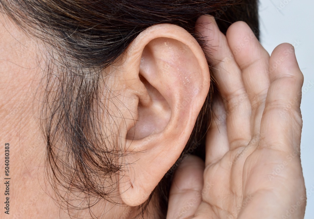 Fototapeta premium Ear of Asian woman with deafness. Concept of keeping the ears open.
