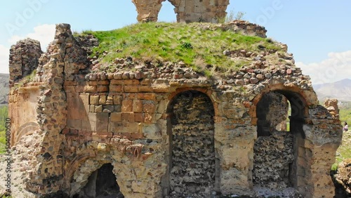 Aerial close up ascending view round georgian orthodox Bana cathedral ruins in Turkey. Famous georgian landmark photo