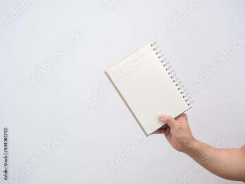 Man hand holding notebook blank page isolated
