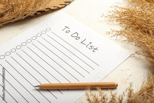 Blank to do list, pen and r...