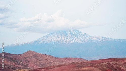 Static panoramic timelapse motion clouds move over Ararat mountain peak. Turkey viewpoint in Kars photo