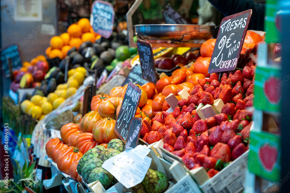 Colorful fresh ripe fruits and vegetables on farmers market in Spain
