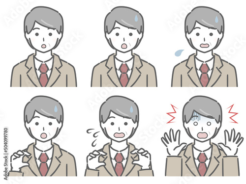 驚く表情の強弱　スーツの中年男性