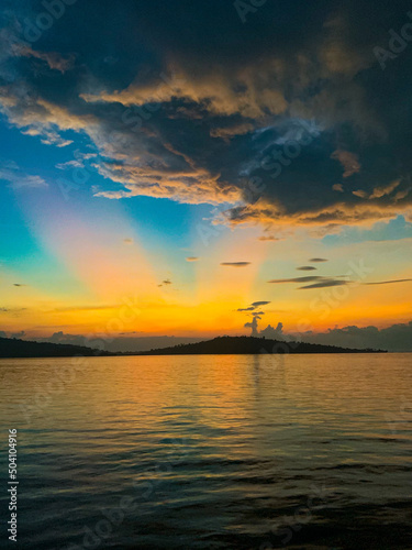 sunset over the sea © Zulfikar