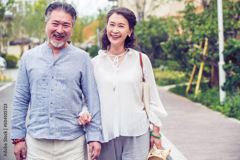 Elderly couple walking in the outdoors