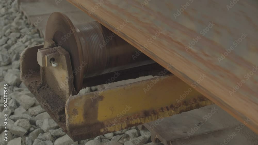 Close up of train tracks being laid. Construction site. Close up of train tracks being laid. Construction site.