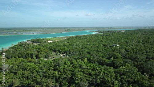 Wallpaper Mural Panning aerial shot of the Laguna de Bacalar o Laguna de 7 Colores Torontodigital.ca
