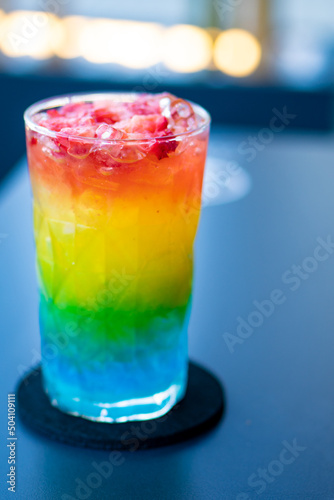 barbados cocktail  with rainbow colors and various flavors. Rum  orange  lime  sugar