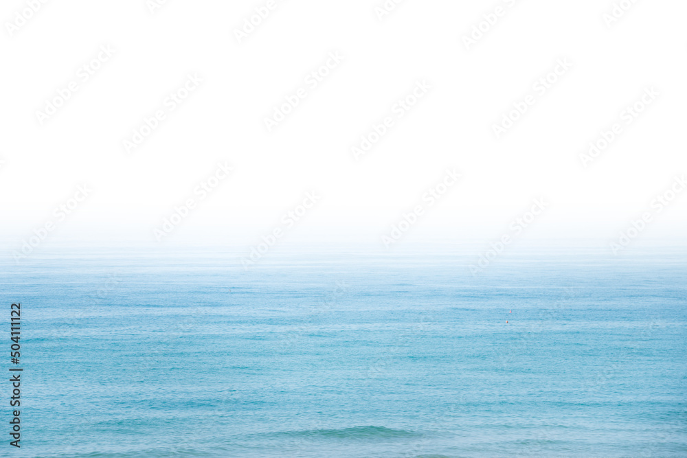 Fototapeta premium Blue sea water with white sky for design copy space