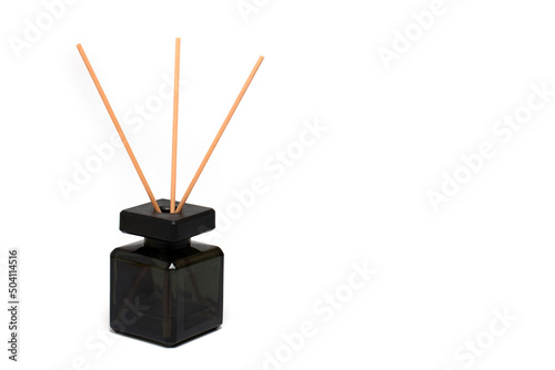 glass flacon sticks fragrance dispenser white background