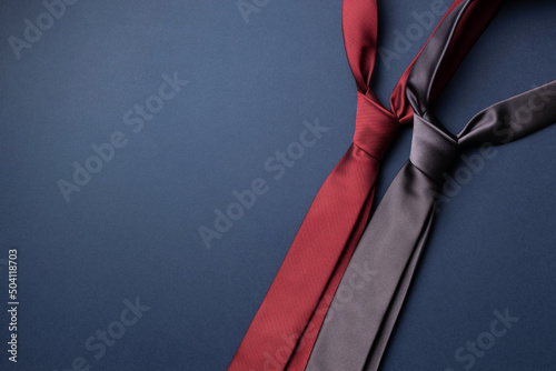 Tableau sur toile Red and Gray neckties on dark blue background. Father's day card.