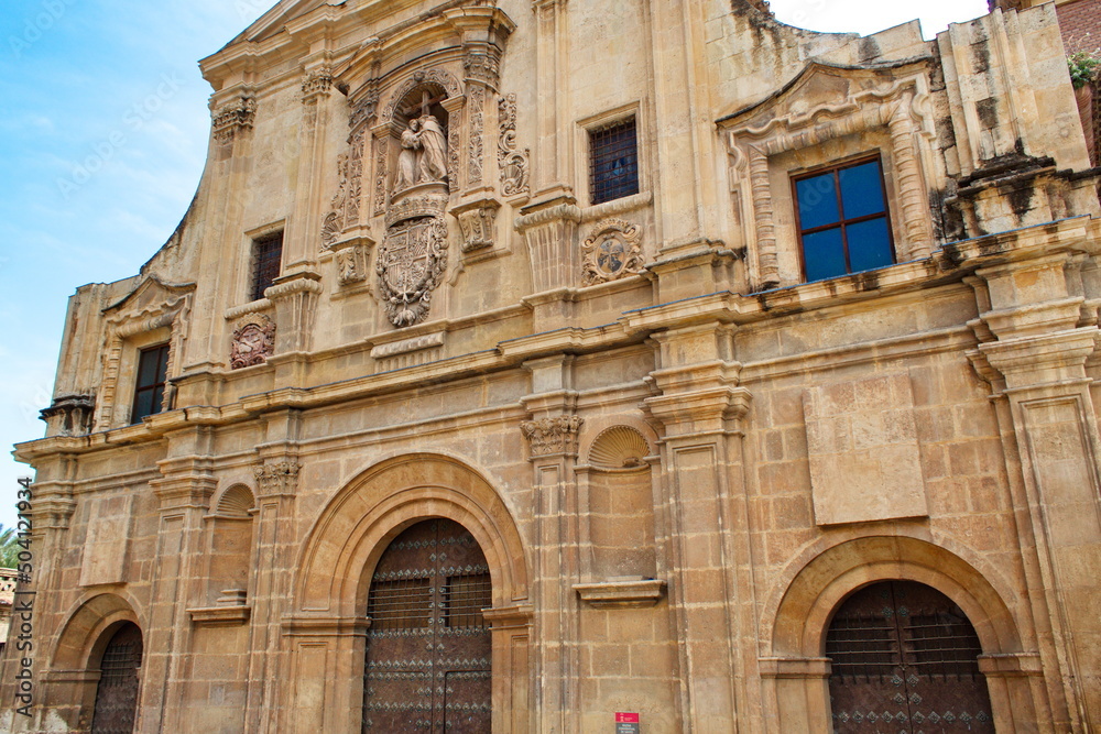 Main facade of the Church of Santo Domingo in Murcia, in baroque style with sculpture