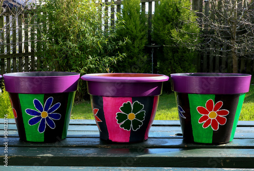 Hand Painted Plant Pots on a Garden Table