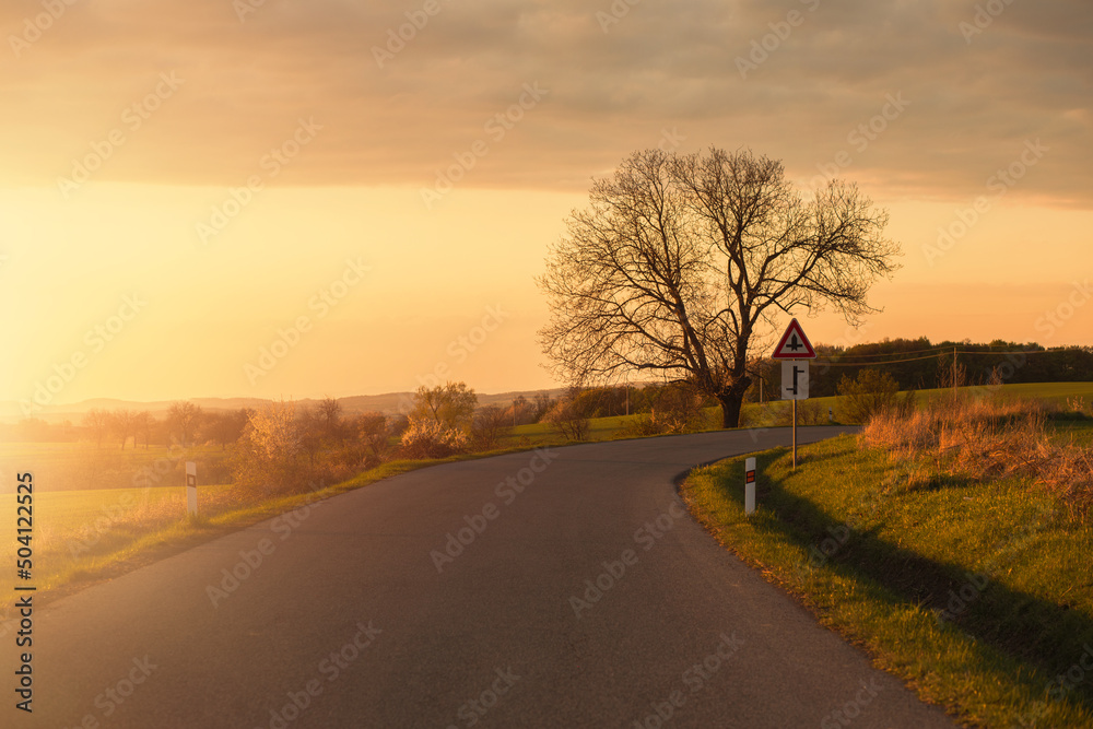 Highway in countryside during sunset.Spring season.High quality photo.