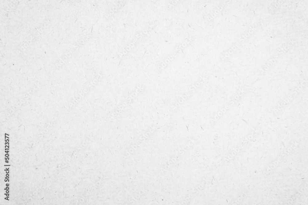 White recycled craft paper texture as background. Grey paper texture, Old vintage page or grunge vignette of old cardboard. 