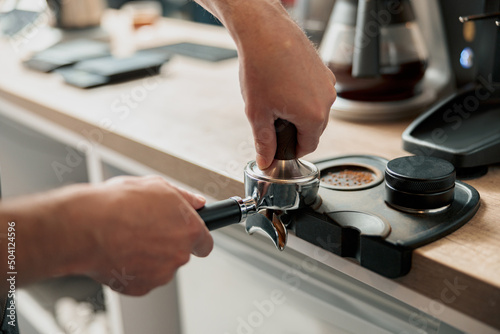 Slika na platnu Process of preparing coffee tablet before instaling it into the coffee machine