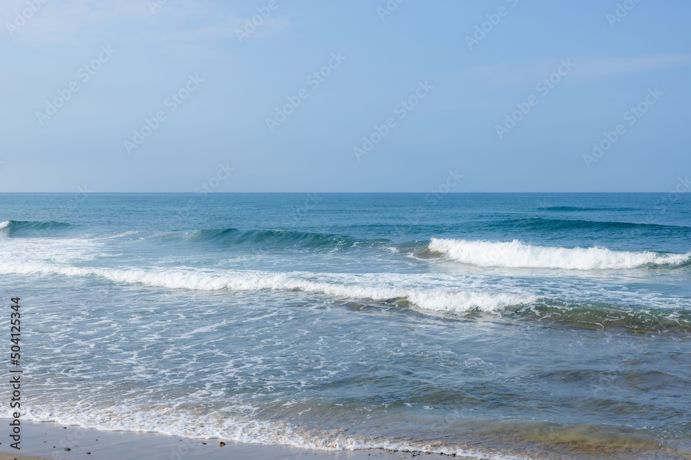 Sea wave splash over the beach