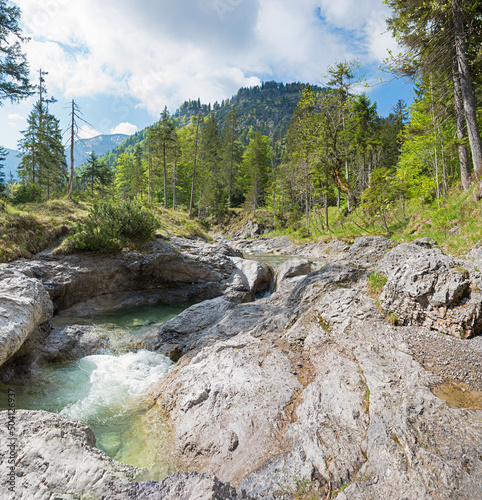 rocky torrent Weissach river, spring landscape Kreuth, bavaria