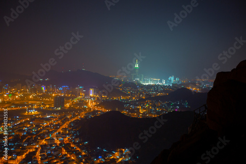 Skyline with Abraj Al Bait (Royal Clock Tower Makkah) in Makkah, Saudi Arabia. The tower is the tallest clock tower in the world at 601m (1972 feet). photo