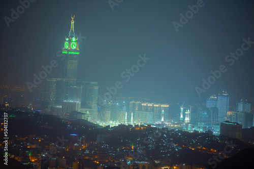 Skyline with Abraj Al Bait (Royal Clock Tower Makkah) in Makkah, Saudi Arabia. The tower is the tallest clock tower in the world at 601m (1972 feet). photo