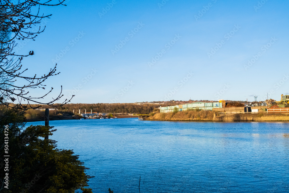 Blaydon UK: 2nd April 2022: River Tyne in Newcastle during golden hour with clear blue skies