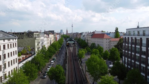 Panorama from public transport in station of elevated train tv tower.
Smooth aerial view flight fly forwards drone footage
of Berlin Prenzlauer Berg Schönauer Allee 2022. Cinematic by Philipp Marnitz photo