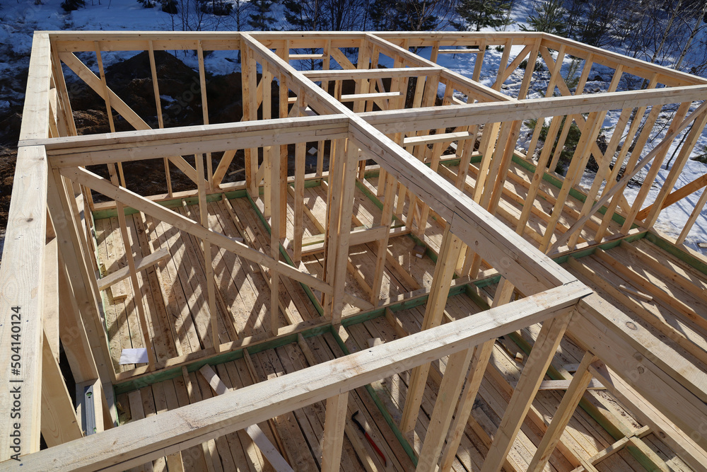 Real construction of wooden frame house, details of elements of future rooms Real construction of wooden frame house, details of elements of future rooms