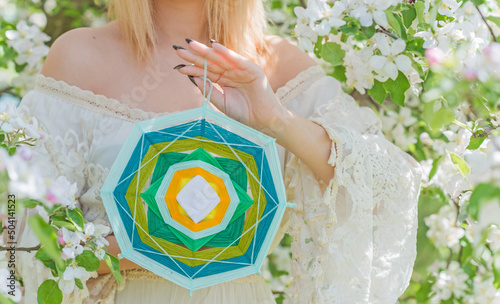  Woman with mandala and magic ball. Energy reiki concept, clean from negative energy photo