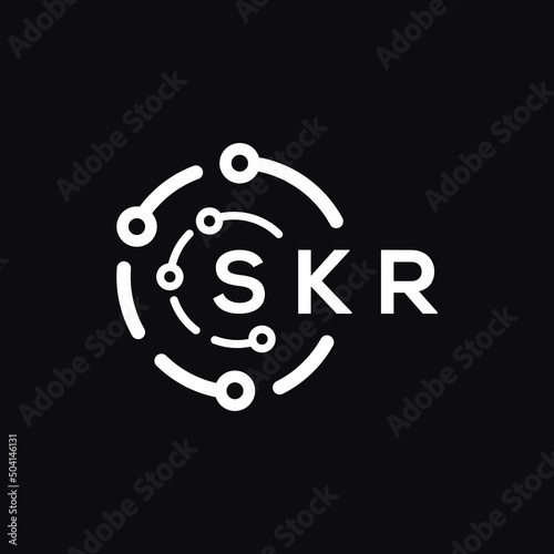 SKR technology letter logo design on black  background. SKR creative initials technology letter logo concept. SKR technology letter design. photo