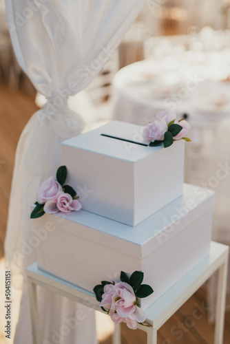  Wedding tradition to collect money presents in symbolic chest. 
