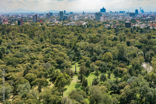 Aerial drone view of Chapultepec Park, city in the background, Mexico City, Mexico