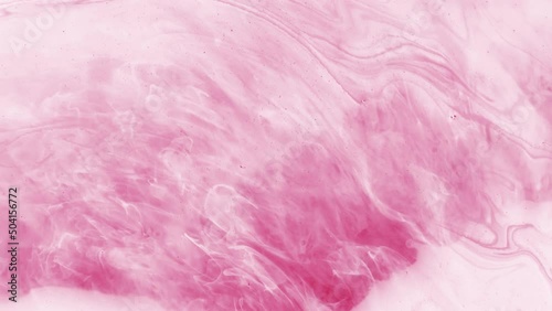 Soft pink and white ink flow.